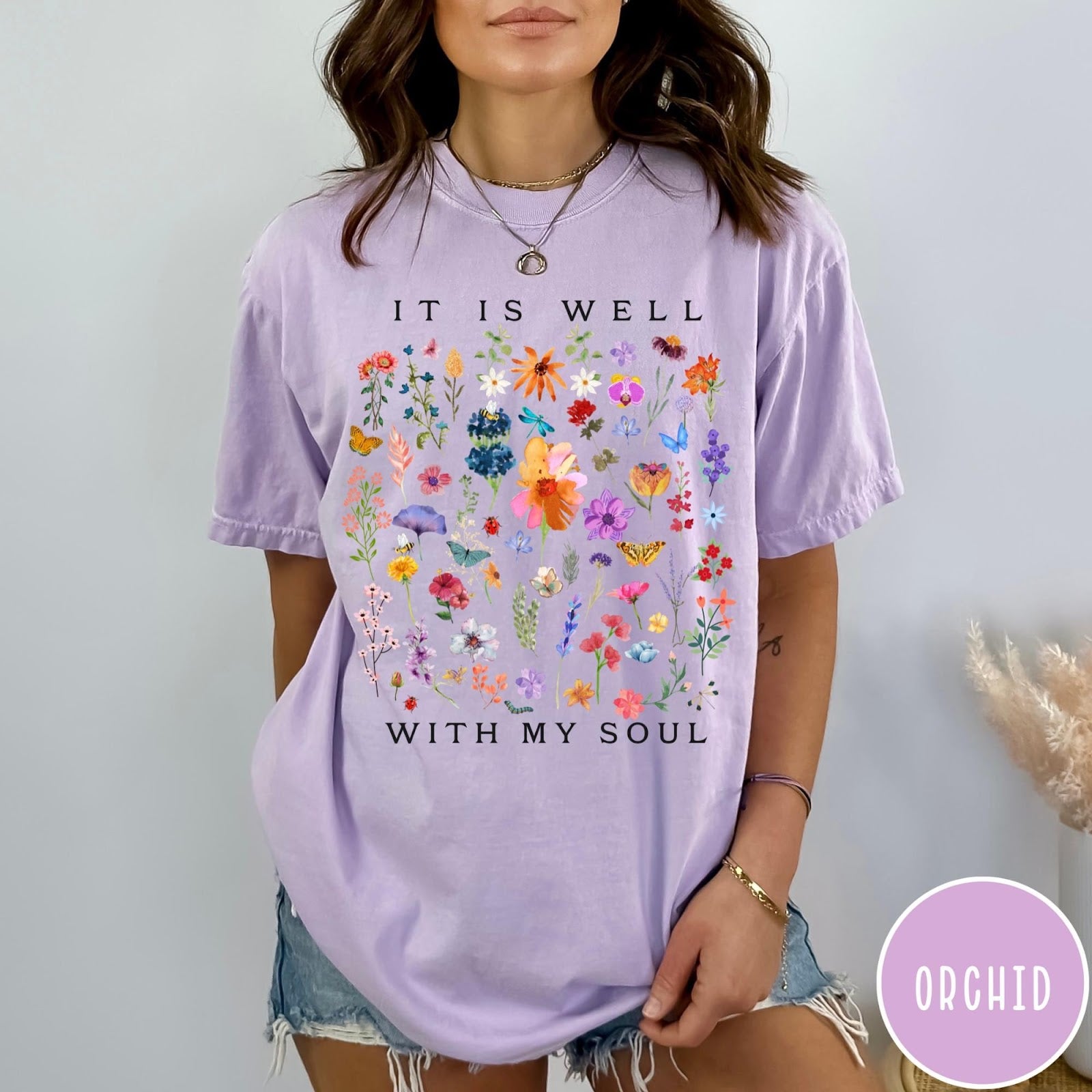 Comfort Colors tee in Orchid featuring wildflower bouquet graphic and It Is Well With My Soul text