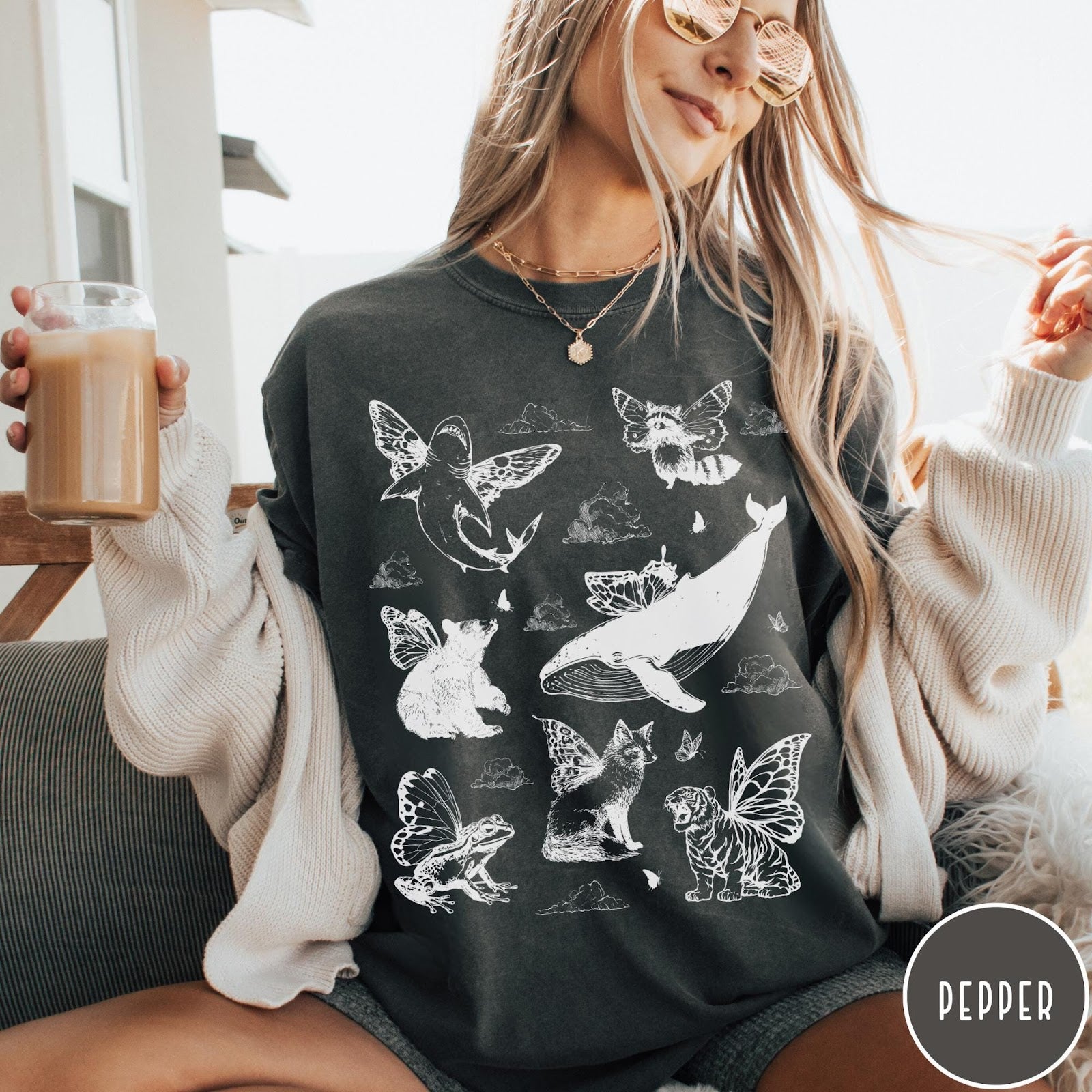 Comfort Colors tee in Pepper featuring vintage style graphic of various animals with butterfly wings and clouds
