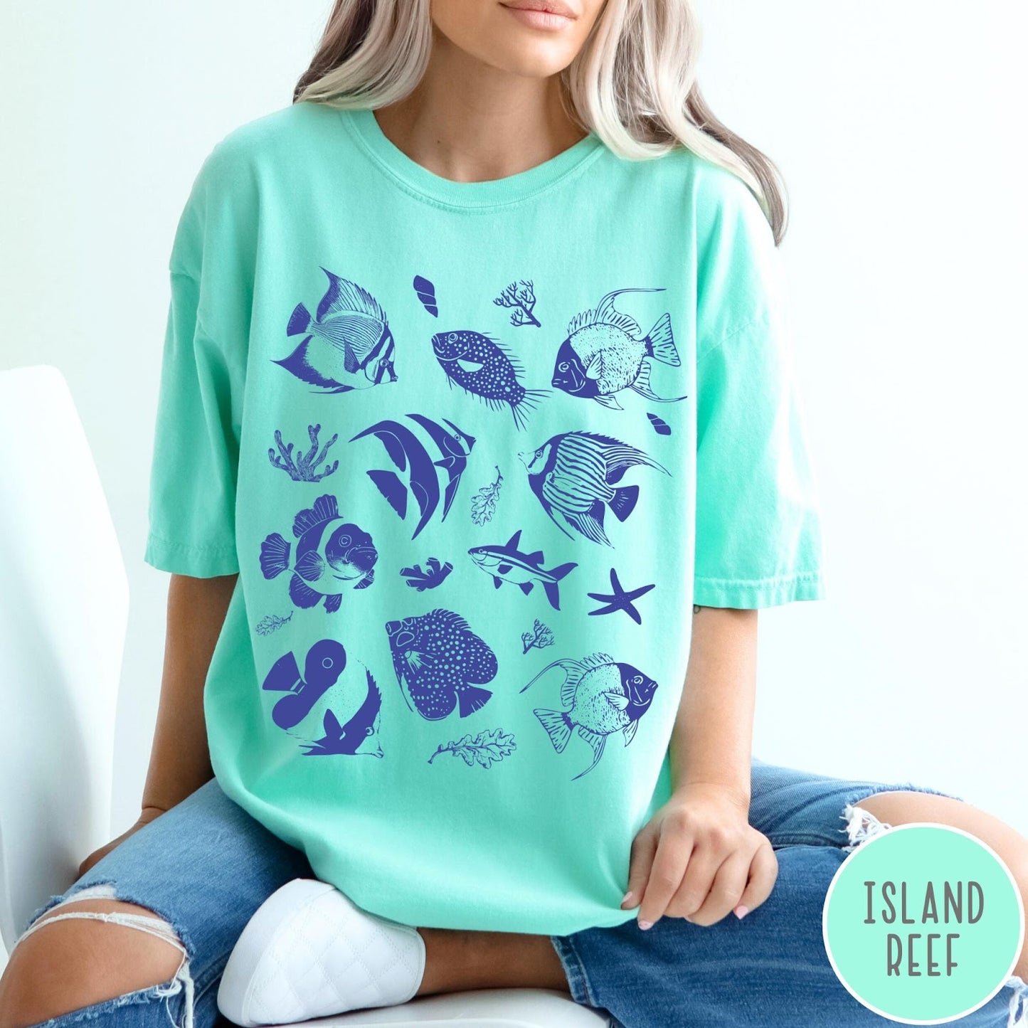 Comfort Colors tee in Island Reef featuring coastal style graphic with various tropical fish and ocean life illustrations