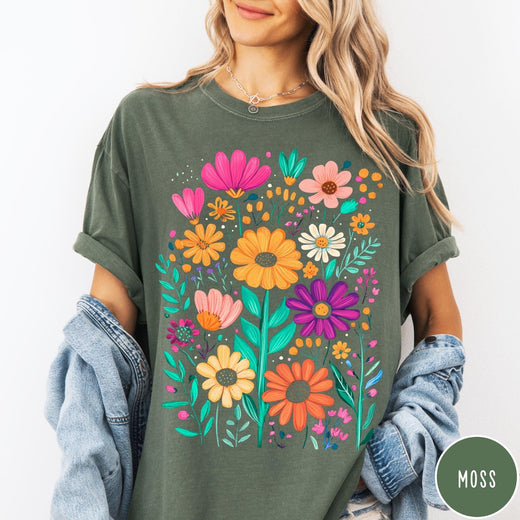 Comfort Colors tee in Moss featuring boho style floral graphic with vibrant orange, pink, and purple flowers