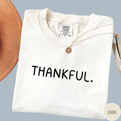 Comfort Colors tee in Ivory featuring minimalist design with the word Thankful printed in black text