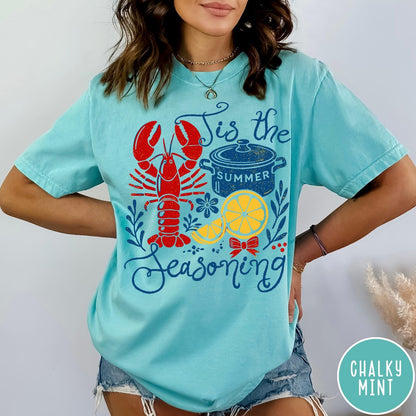 Comfort Colors tee in Chalky Mint featuring lobster boil graphic with a lobster, cooking pot, and lemon slices.