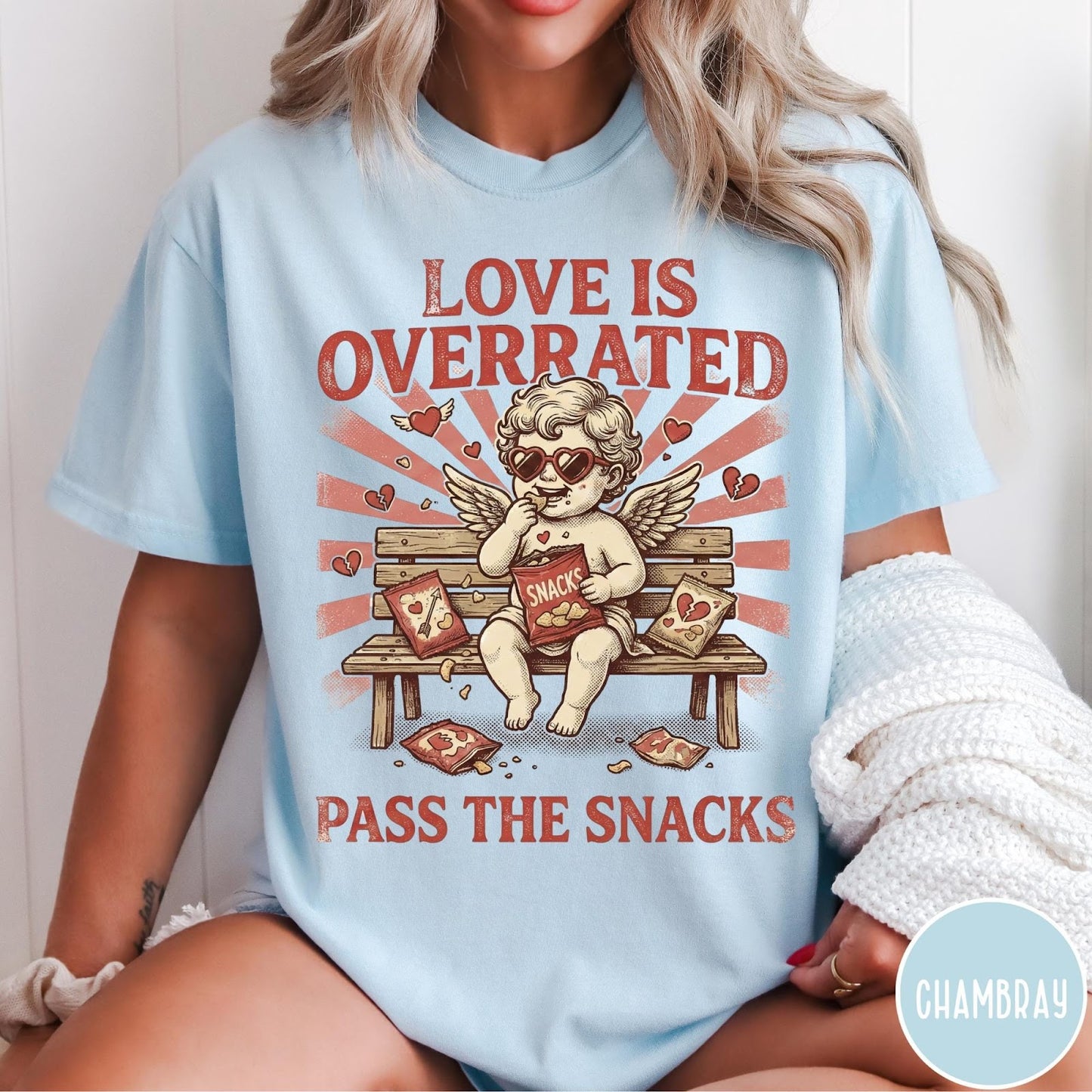 Comfort Colors tee in Chambray featuring vintage style graphic of a cherub eating snacks on a bench
