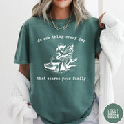 Comfort Colors tee in Light Green featuring vintage style graphic of a girl wrestling an alligator
