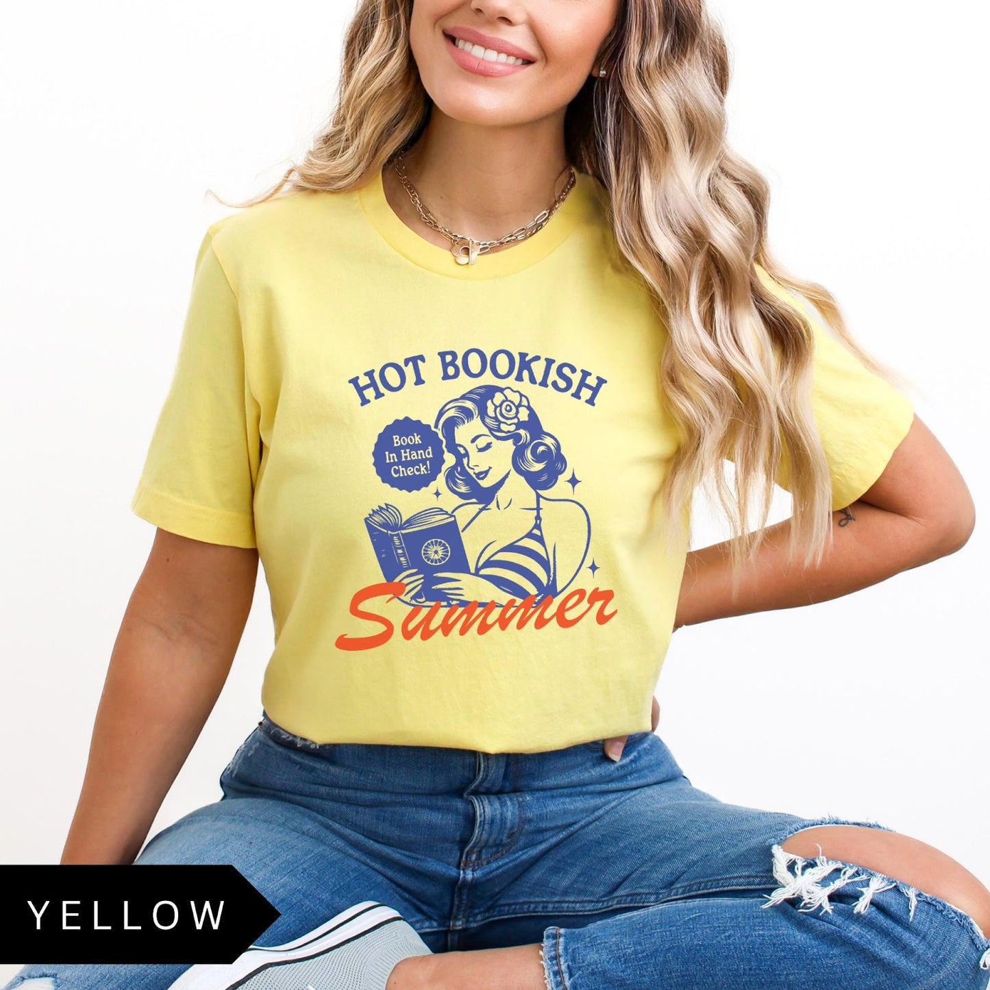 Comfort Colors tee in Yellow featuring pinup girl reading a book graphic design with blue and orange ink