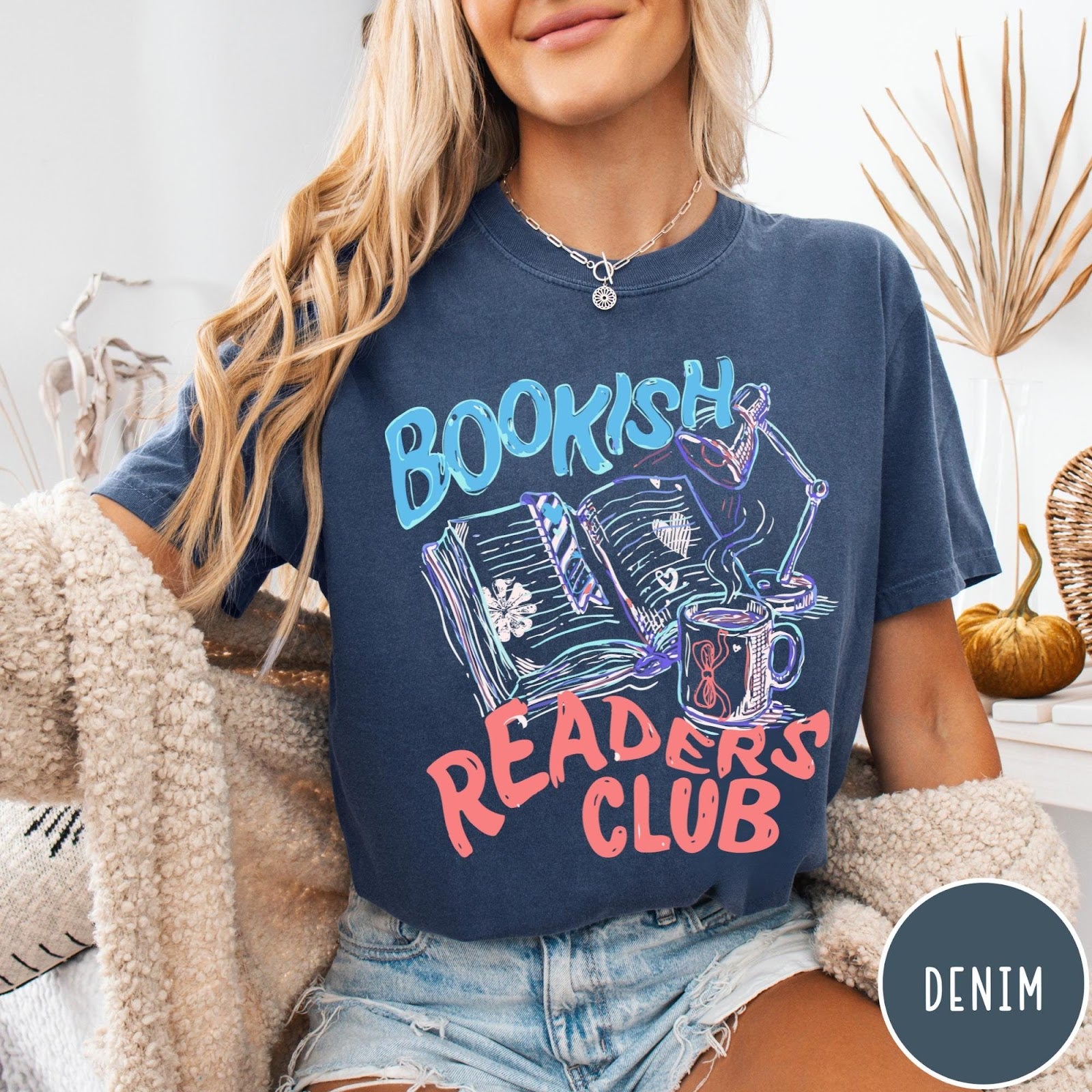 Comfort Colors tee in Denim featuring illustrated book graphic with a lamp and a coffee mug design