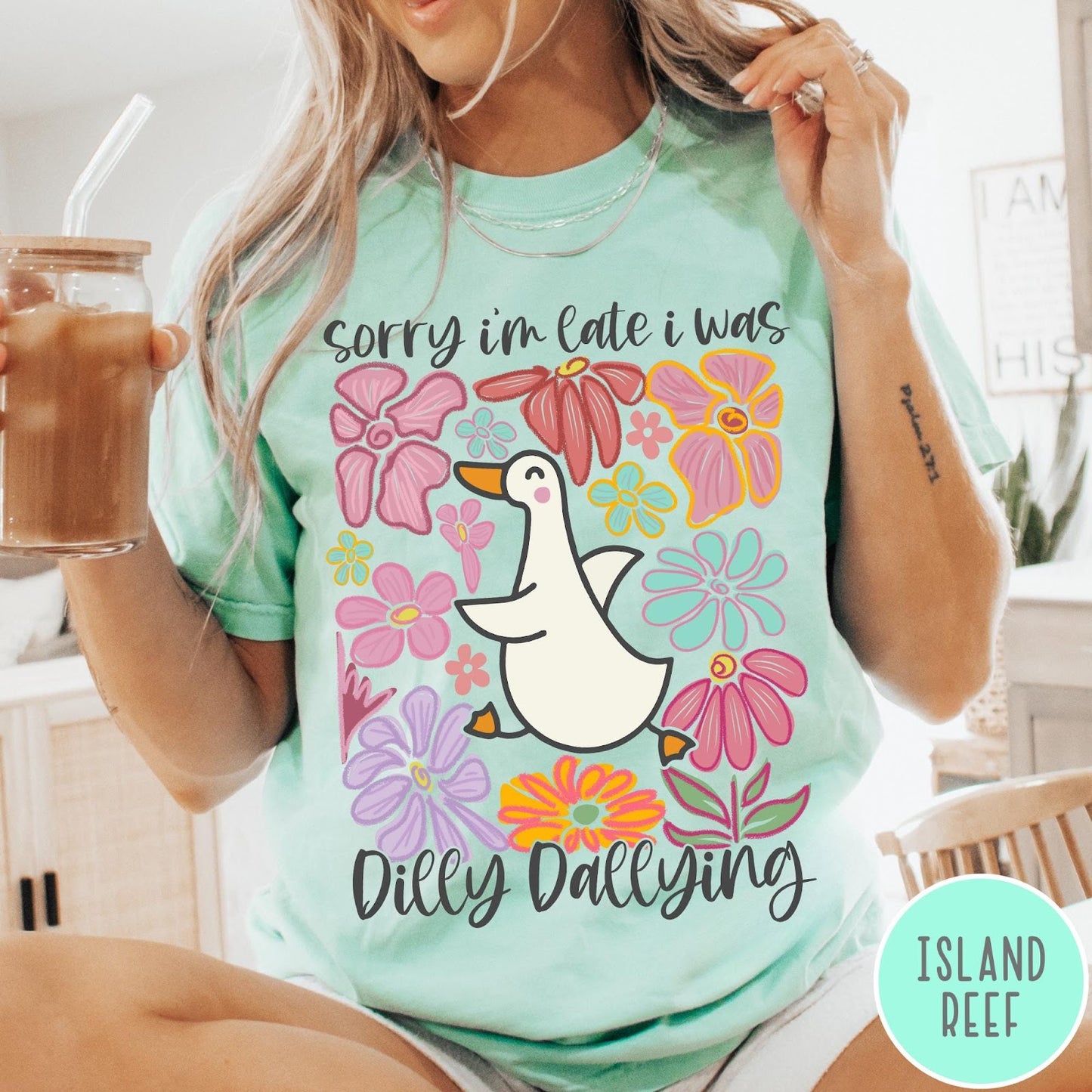 Comfort Colors tee in Island Reef featuring cute duck graphic with colorful flowers and Sorry I Was Dilly Dallying text