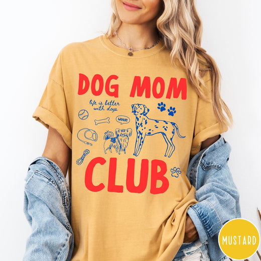 Comfort Colors tee in Mustard featuring playful dog-themed graphic with Dalmatian and text Dog Mom Club