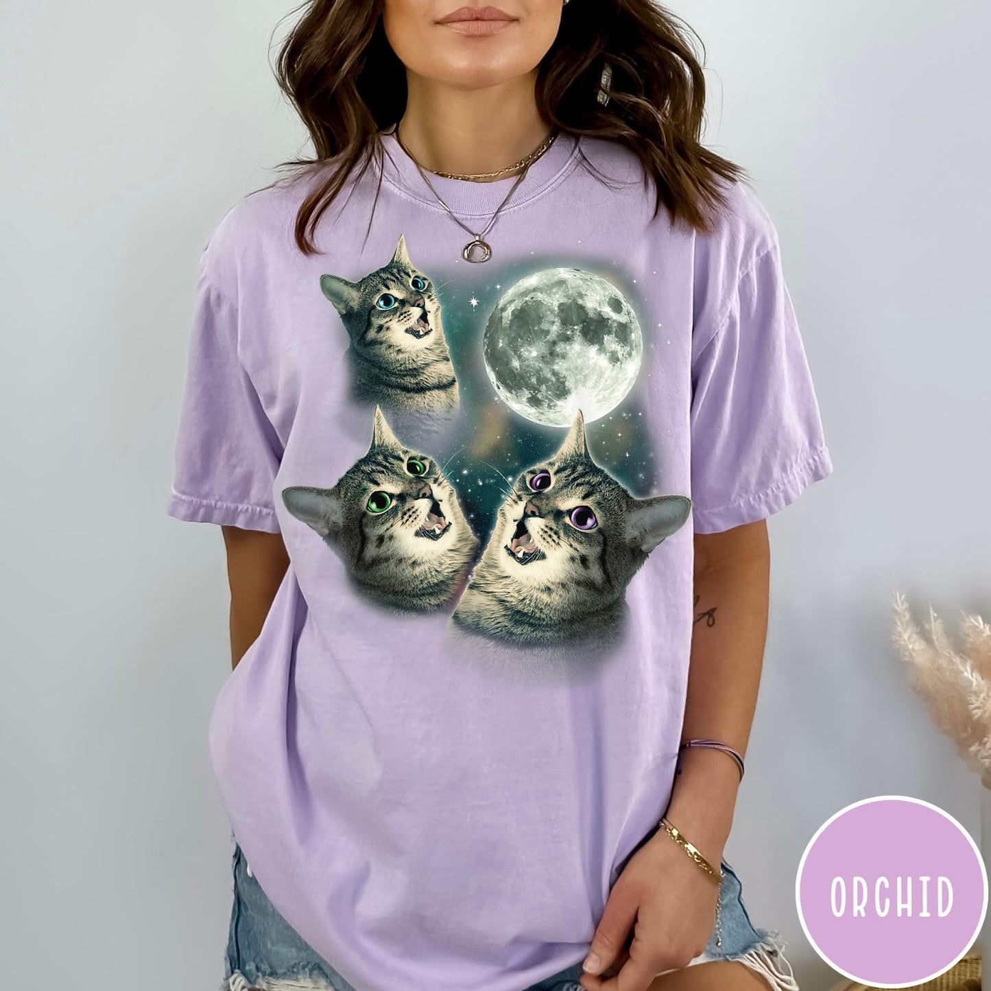 Comfort Colors tee in Orchid featuring retro style graphic of three cats looking up at the moon