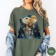 Comfort Colors tee in Moss featuring artistic graphic design of a Golden Retriever in a moonlit forest scene