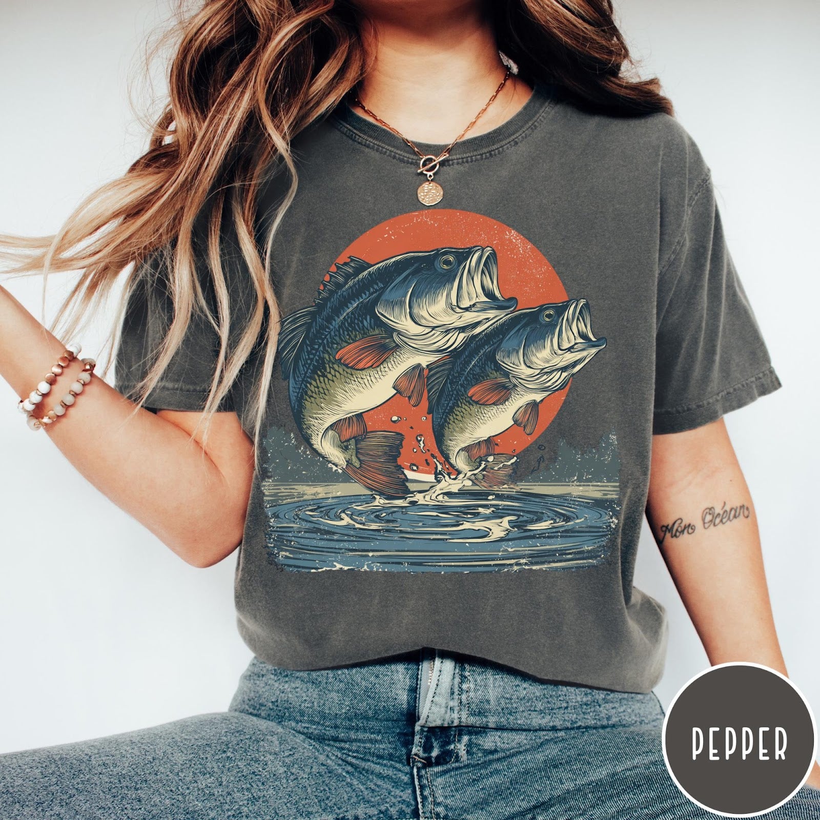 Comfort Colors tee in Pepper featuring vintage style graphic of two bass fish jumping out of water