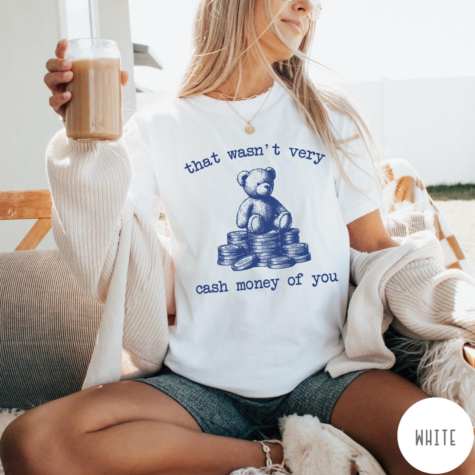 Comfort Colors tee in White featuring graphic style teddy bear sitting on a stack of coins