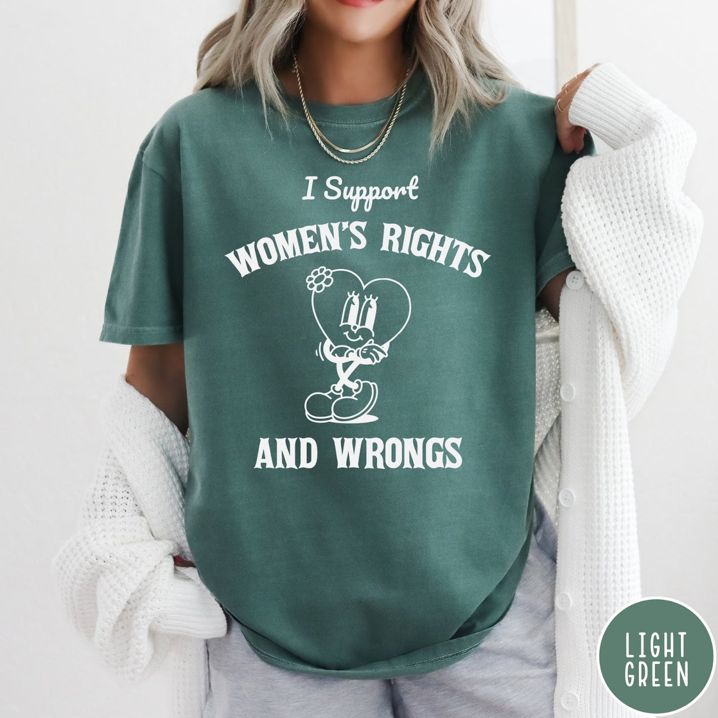 Comfort Colors tee in Light Green featuring retro style heart mascot graphic with women's rights text