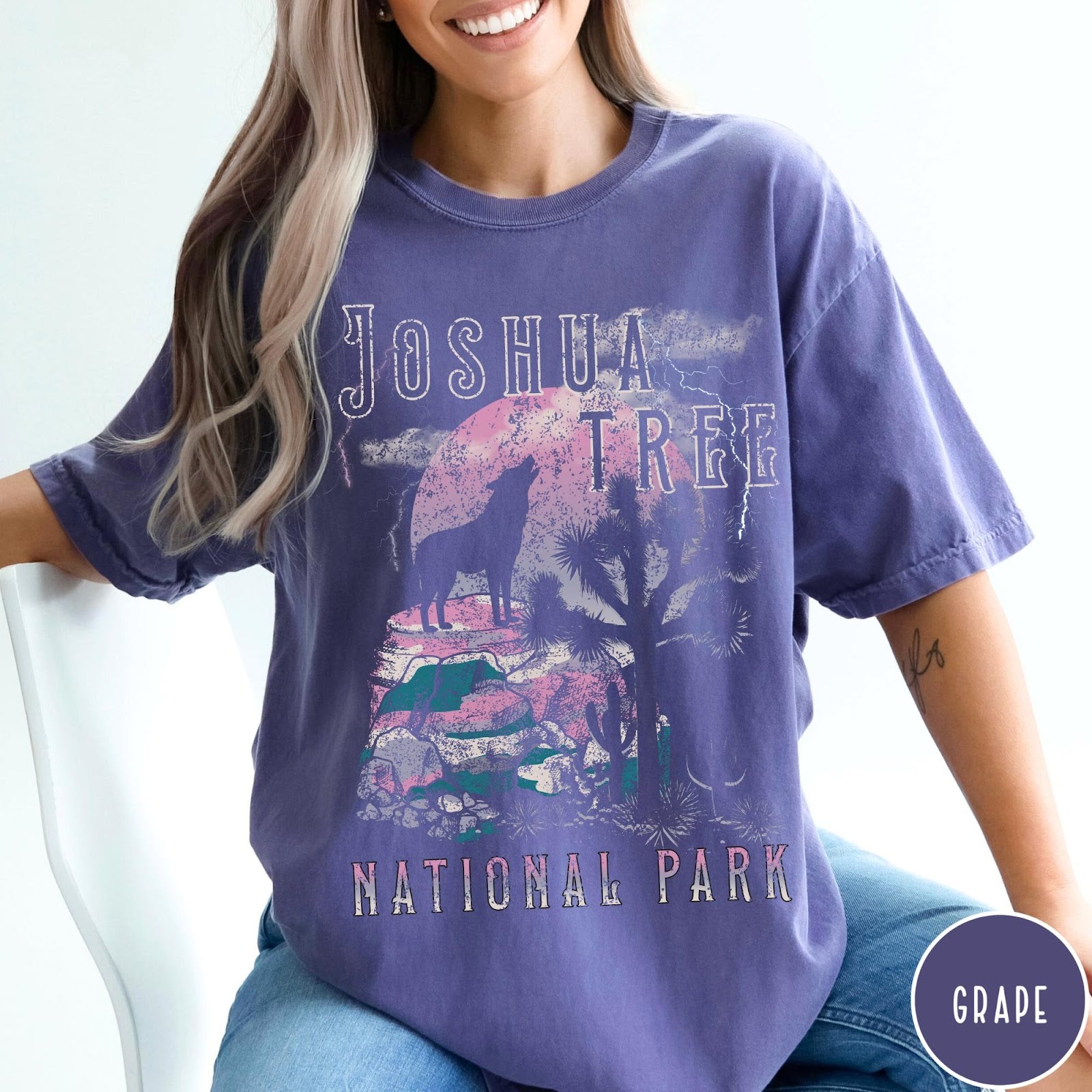 Comfort Colors tee in Grape featuring vintage style graphic of a howling wolf at Joshua Tree National Park