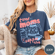 Comfort Colors tee in Denim featuring coffee themed graphic with teapot and stacked mugs and text design