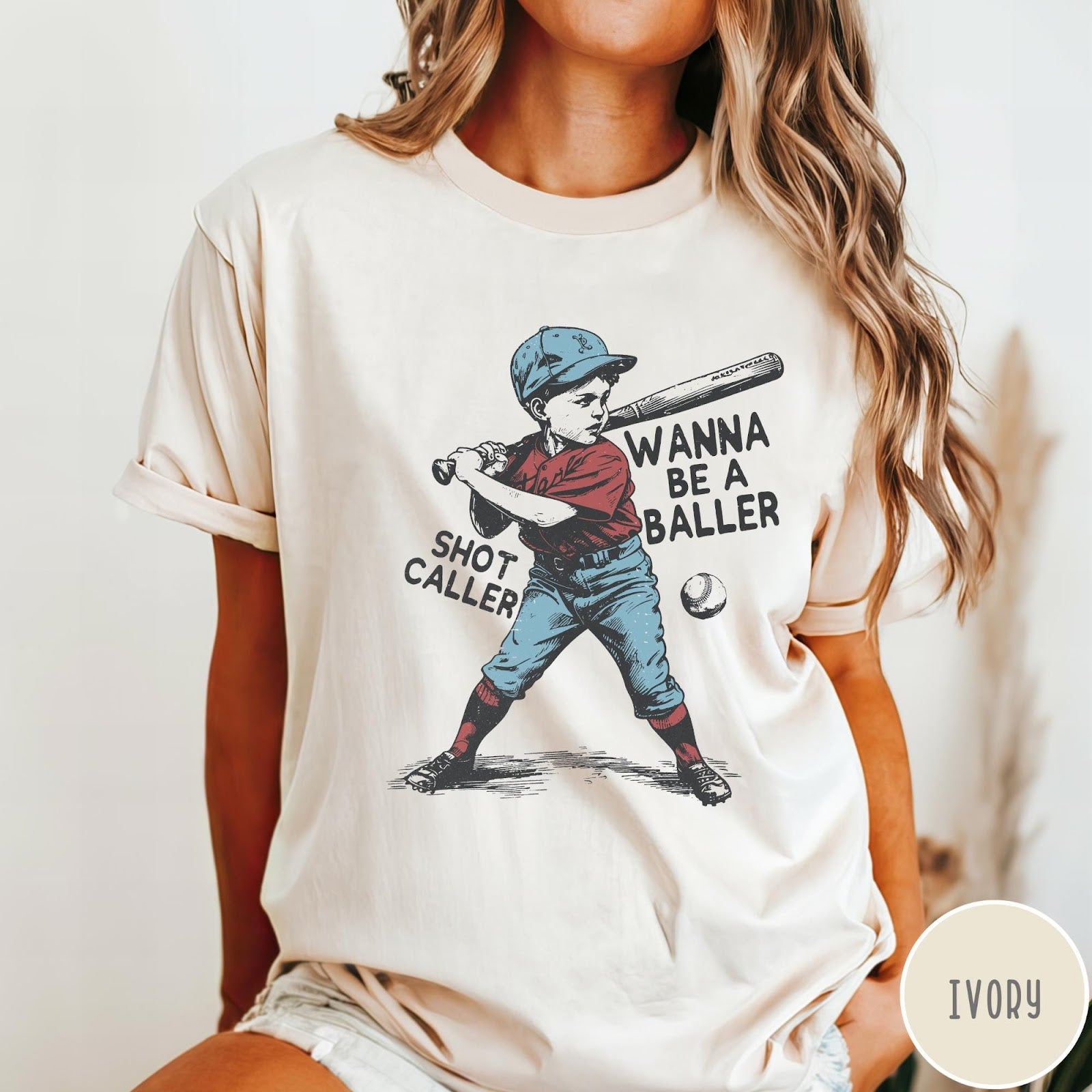Comfort Colors tee in Ivory featuring vintage style baseball player graphic with Wanna Be a Baller text
