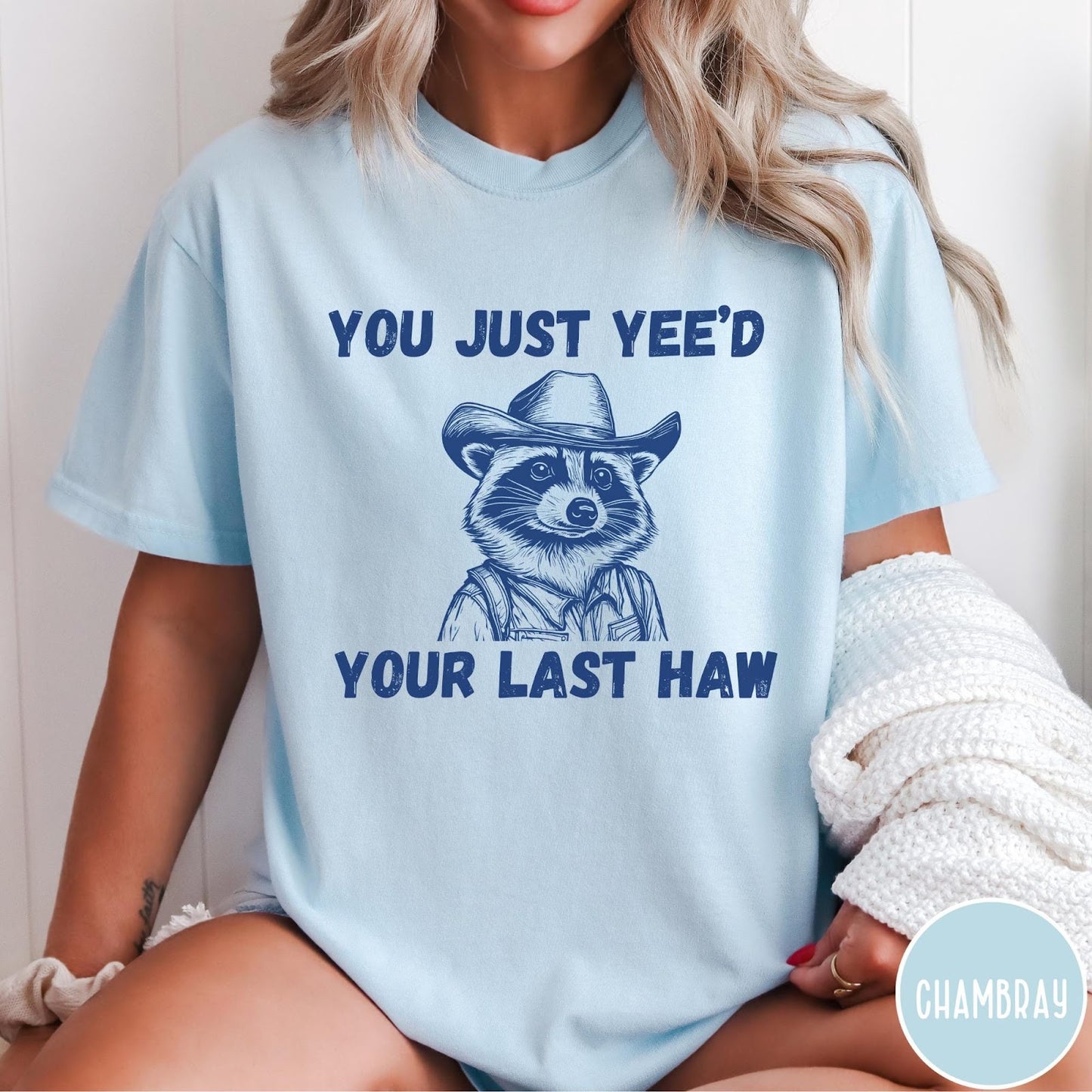 Comfort Colors tee in Chambray featuring western style graphic of a raccoon wearing a cowboy hat