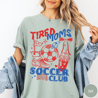 Comfort Colors tee in Bay featuring soccer mom life graphic with soccer ball and iced coffee
