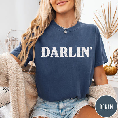 Comfort Colors tee in Denim featuring western typography with the word Darlin' in a distressed white font