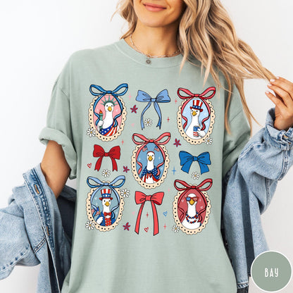 Comfort Colors tee in Bay featuring coquette design with patriotic geese in frames and bows