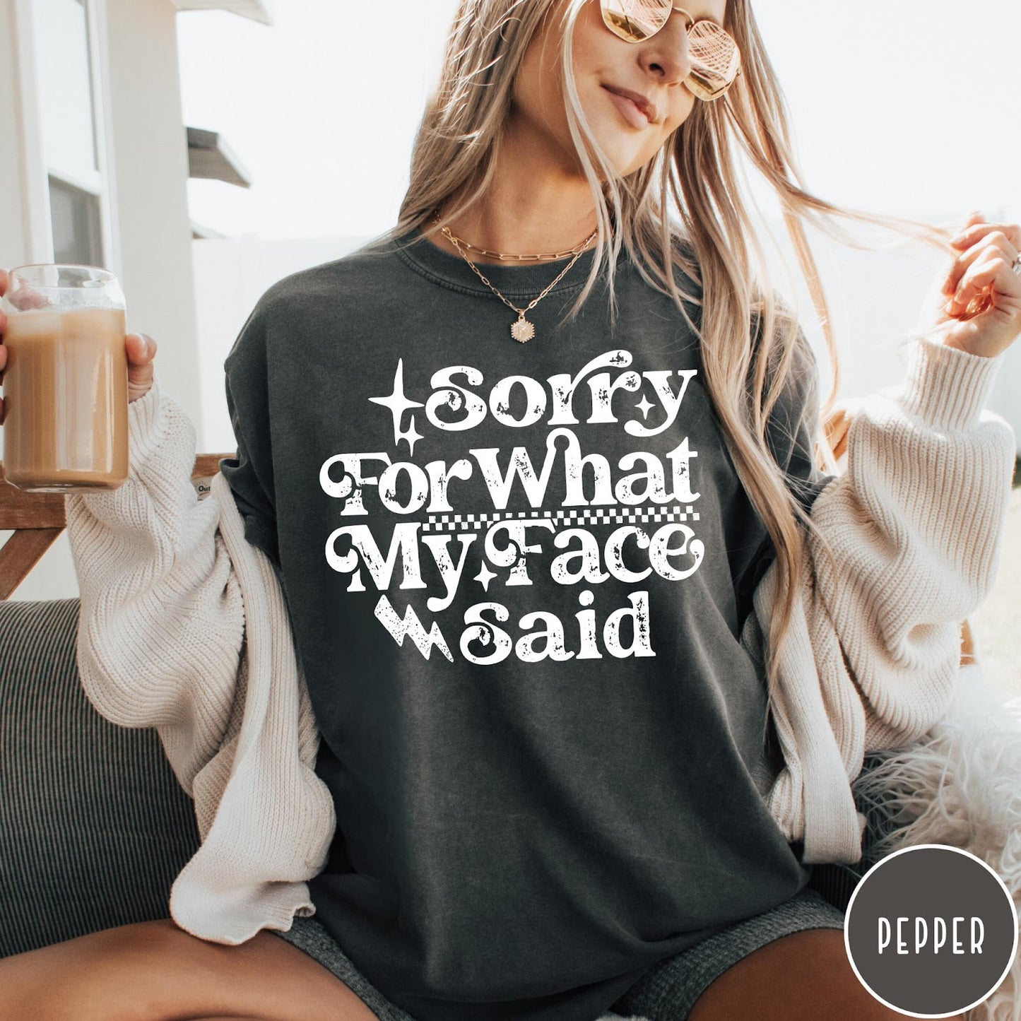 Comfort Colors tee in Pepper featuring sarcastic expression graphic with Sorry For What My Face Said text