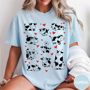Comfort Colors tee in Chambray featuring cute cow lover graphic with various black and white cow illustrations