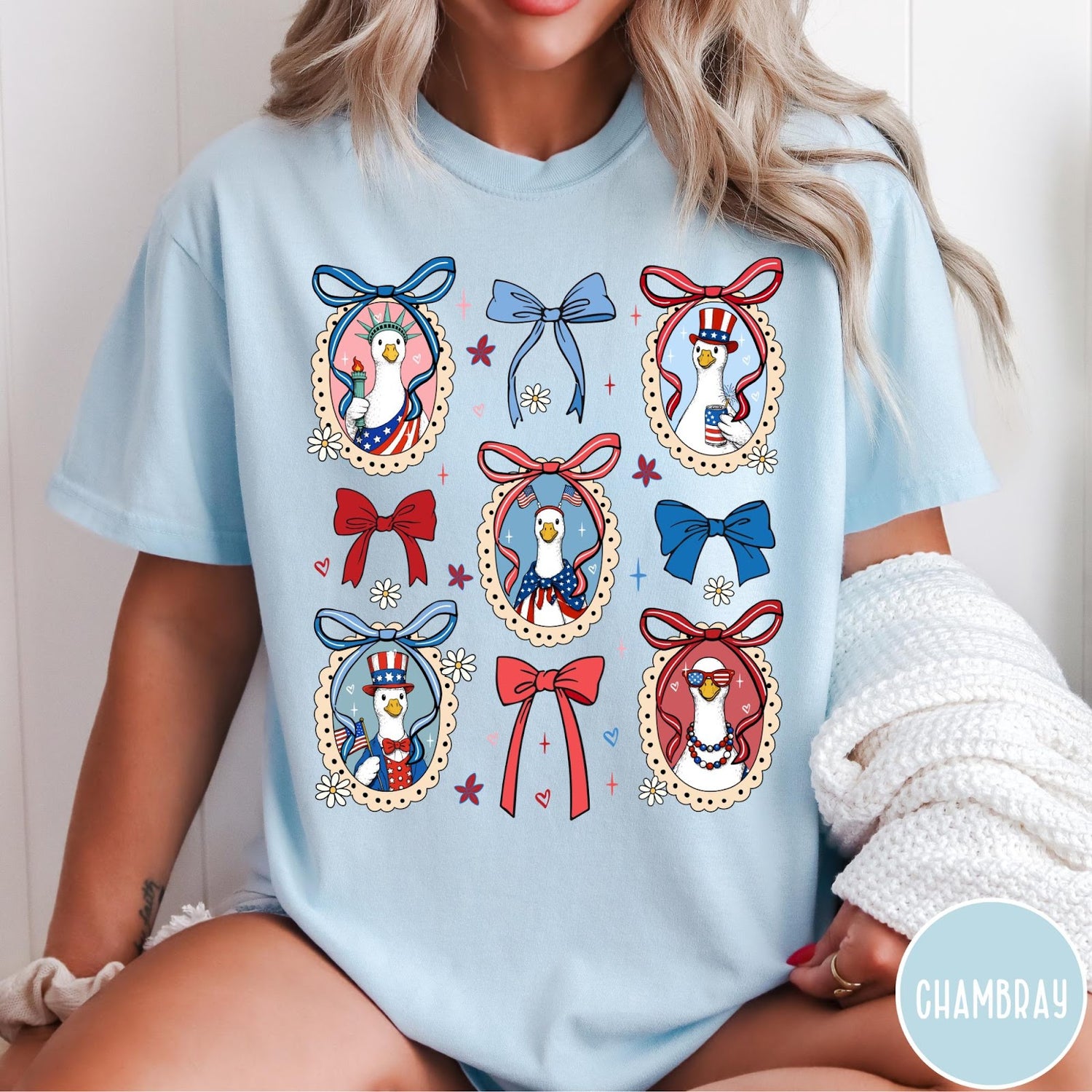 Comfort Colors tee in Chambray featuring coquette style patriotic goose graphic with bows and floral accents