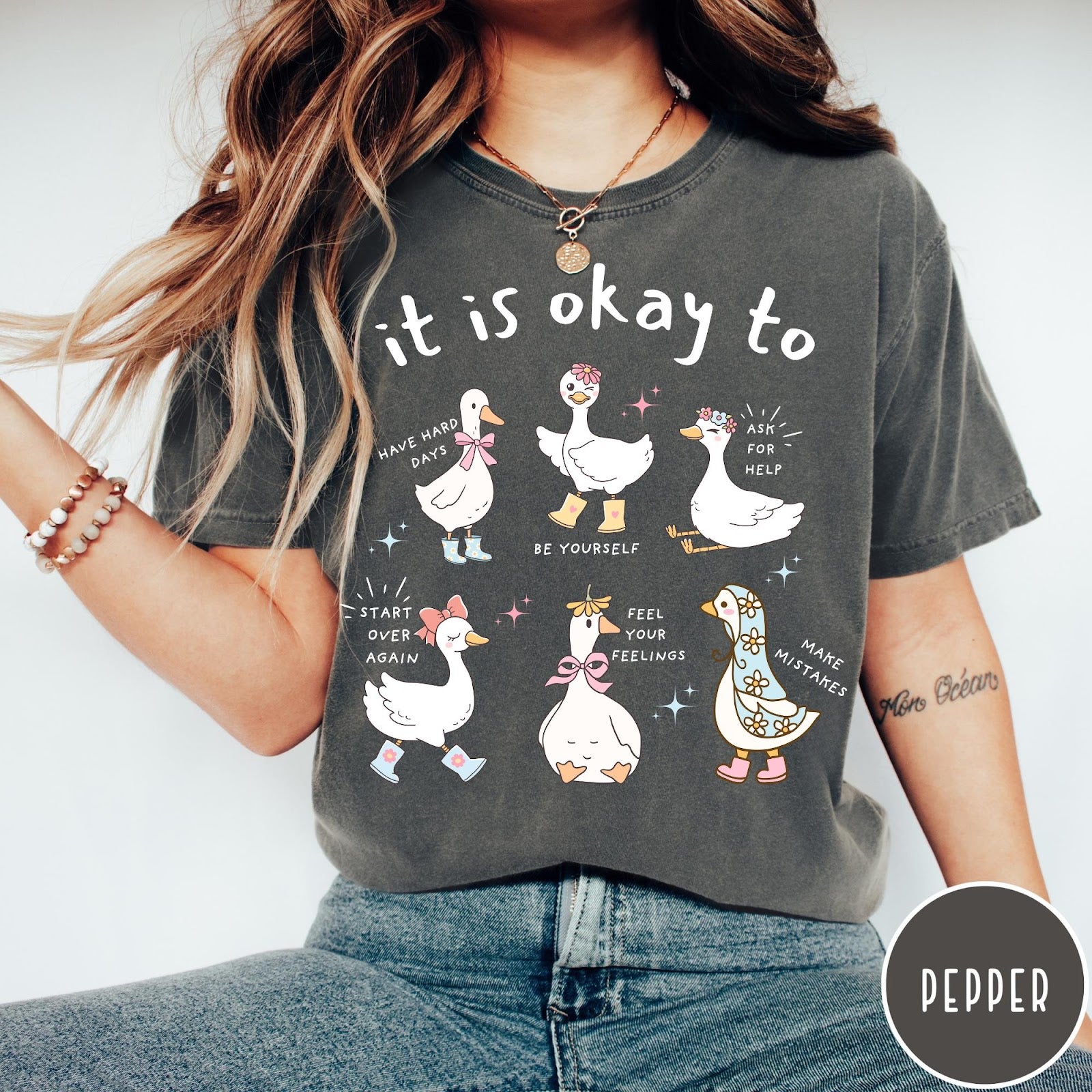 Comfort Colors tee in Pepper featuring whimsical graphic style with six cute geese and motivational text phrases