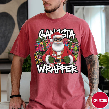 Comfort Colors tee in Crimson featuring cartoon style Santa Claus wearing sunglasses and gold chain holding wrapping paper