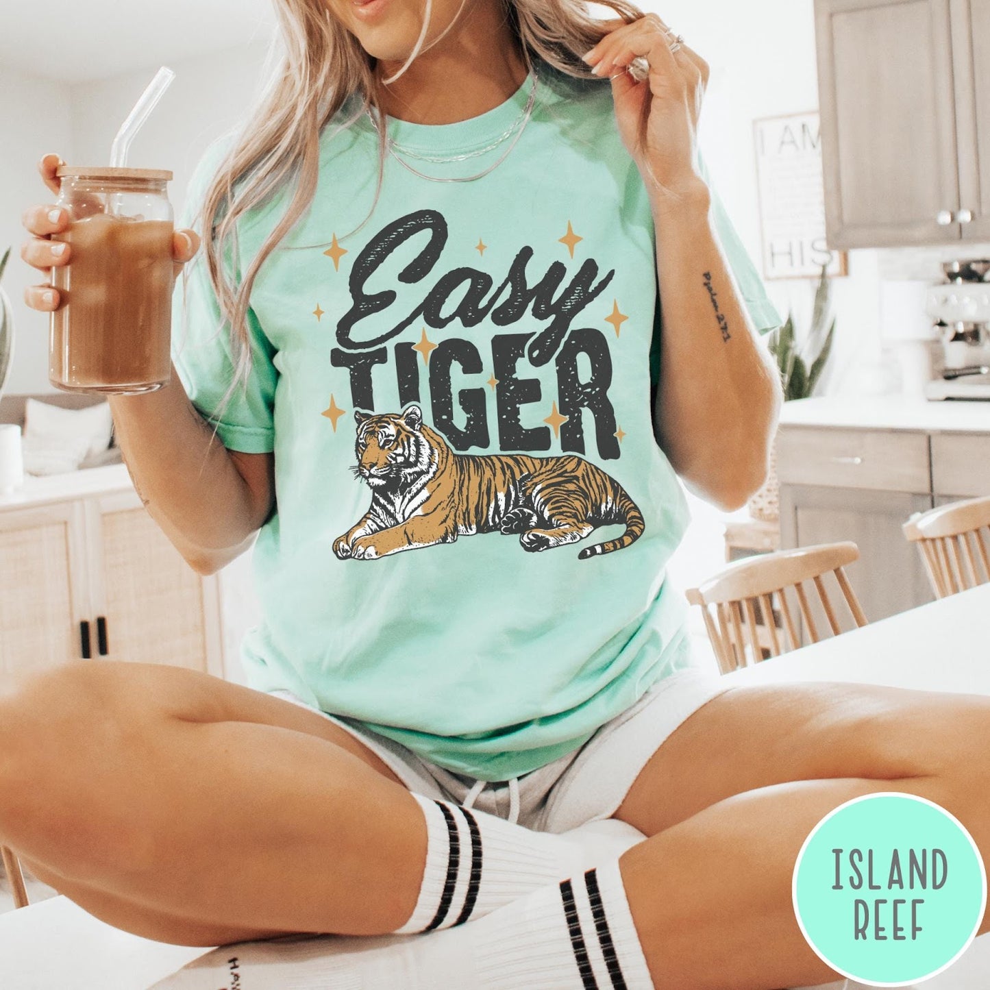 Comfort Colors tee in Island Reef featuring vintage style graphic of a tiger with Easy Tiger text