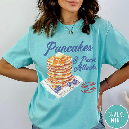 Comfort Colors tee in Chalky Mint featuring watercolor style graphic of a stack of pancakes with blueberries and syrup