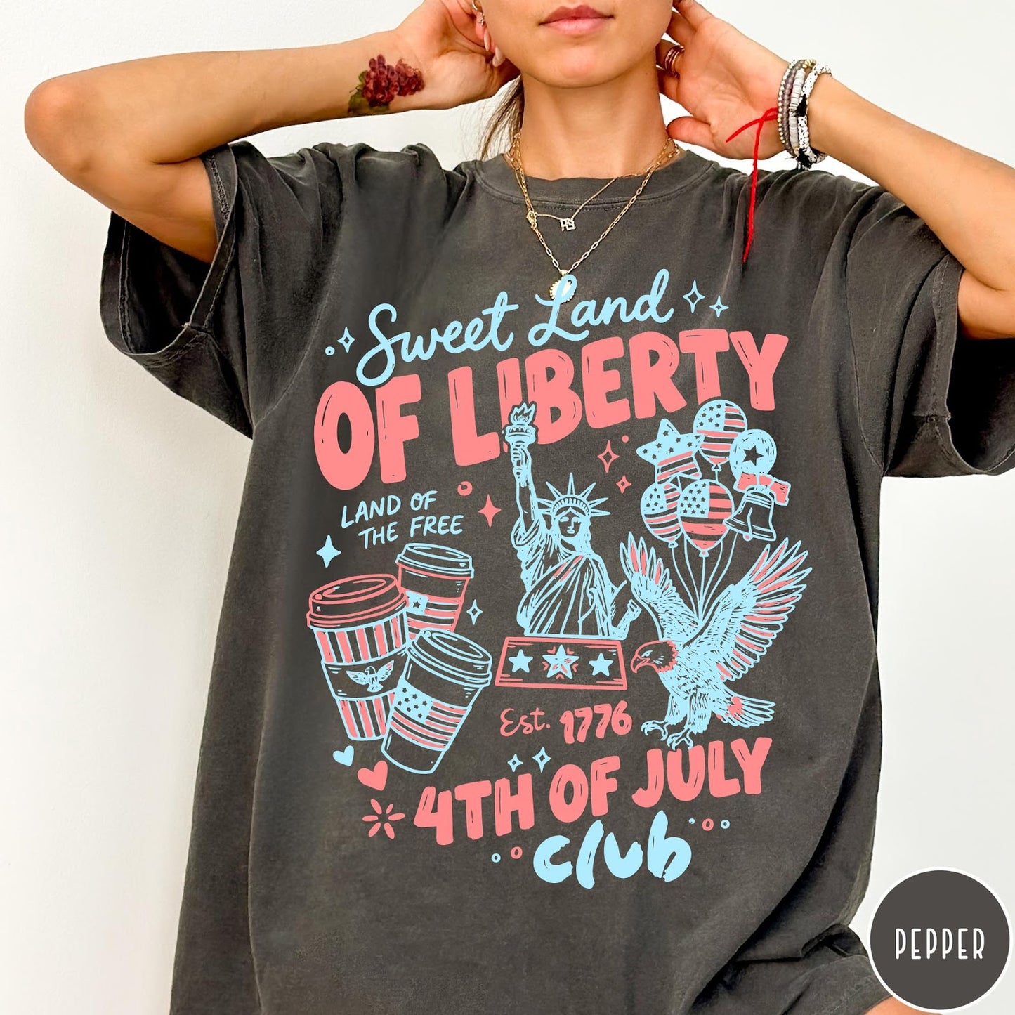 Comfort Colors tee in Pepper featuring 4th of July celebration graphic with Statue of Liberty and eagle