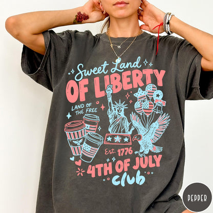 Comfort Colors tee in Pepper featuring 4th of July celebration graphic with Statue of Liberty and eagle