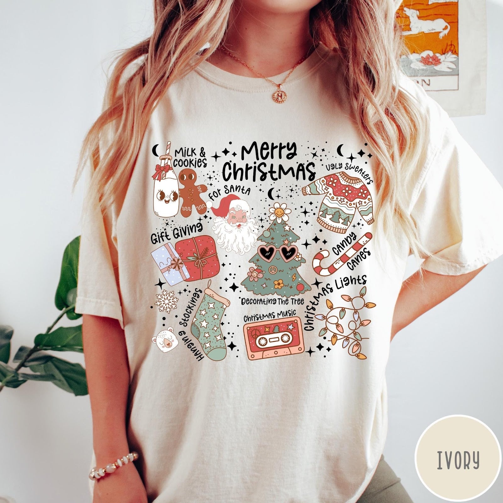 Comfort Colors tee in Ivory featuring retro holiday graphic with Santa, Christmas tree, and festive icons