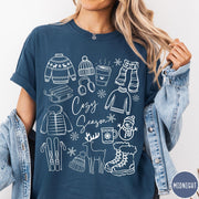 Comfort Colors tee in Midnight featuring line art winter activities and seasonal items graphic design